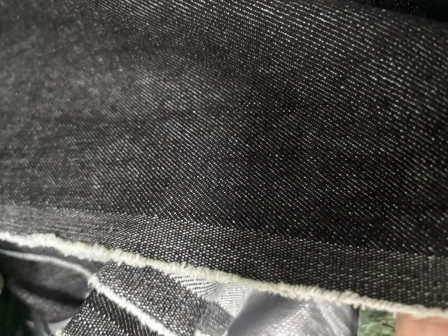 前景广进黑色无弹原浆大牛风格纯棉牛仔布料面料复古风服装设计师