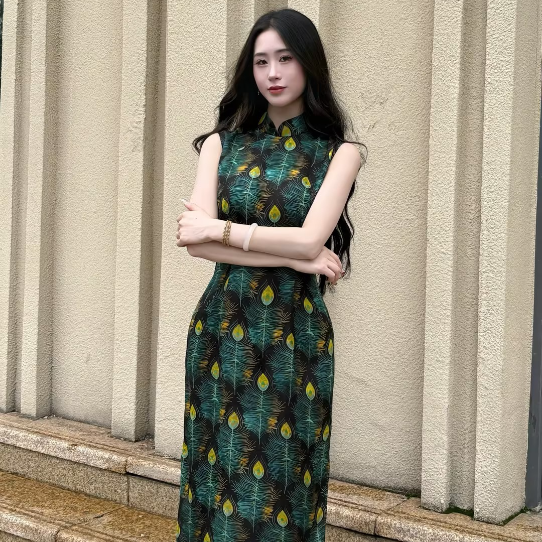 LHMknk1画报夫人原创国风纯人丝孔雀羽毛无袖港工旗袍 辣孔雀