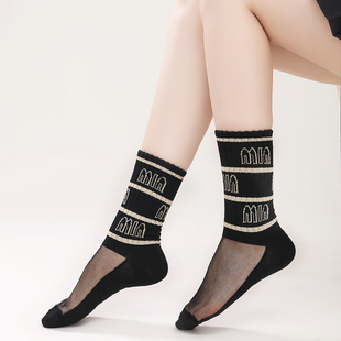 网红款女袜子女中筒ins棉底水晶黑丝长筒袜字母简约塑形纯色美腿