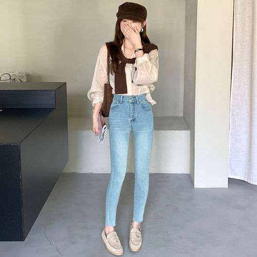 浅蓝色小脚牛仔裤女春秋新品2026高腰双扣毛边弹力紧身显瘦铅笔裤