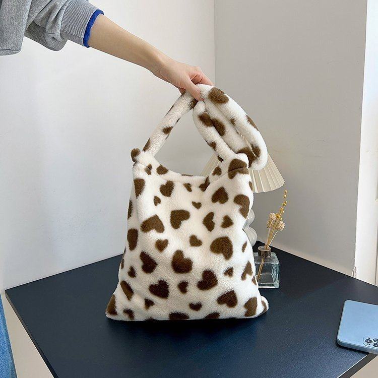 秋冬毛毛包2025韩版大容量小清新奶牛纹单肩学生手提水桶包