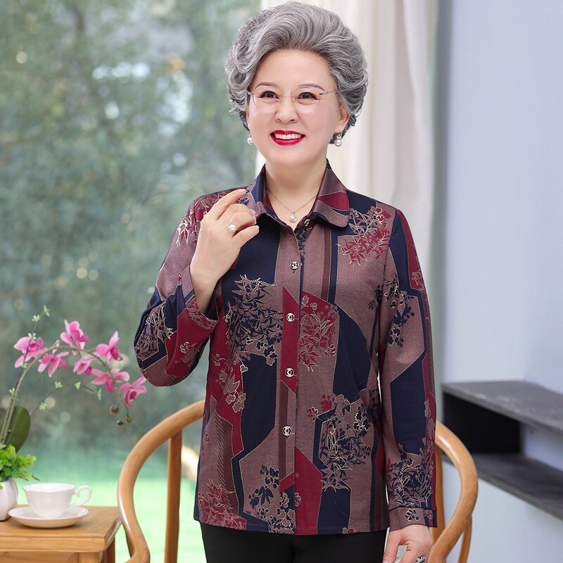 เสื้อผ้าฤดูร้อนสำหรับสตรีวัยกลางคนและผู้สูงอายุ เสื้อเชิ้ตคุณย่า เสื้อตัวบนสำหรับคุณแม่ในฤดูใบไม้ผลิและฤดูใบไม้ร่วง เสื้อผ้าสำหรับผู้สูงอายุอายุ 60–70 ปี ชุดเสื้อเชิ้ตสำหรับภรรยา