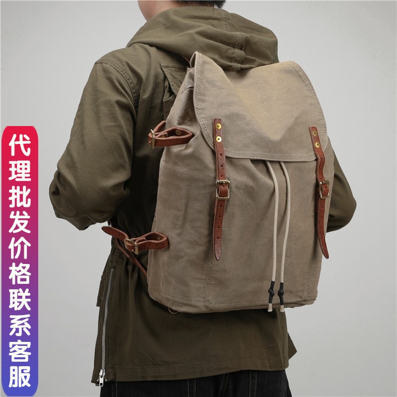2025秋冬欧美重磅防泼水帆布包大容量登山旅行包男士户外露营