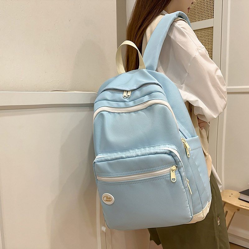 双肩包背包休闲轻便纯色简约高