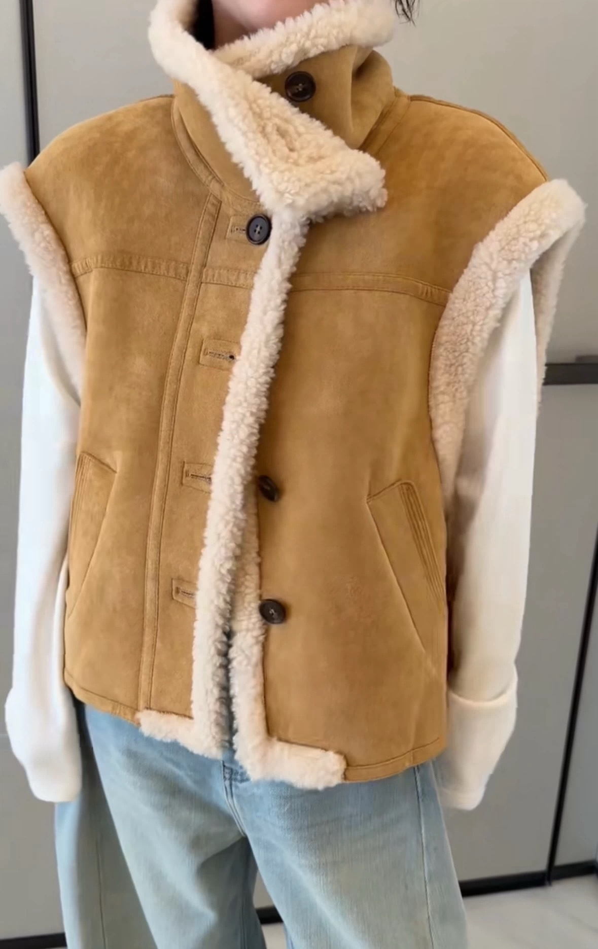 诗歌兰女装2025冬款 9909韩系休闲简约皮毛一体立领保暖马甲外套