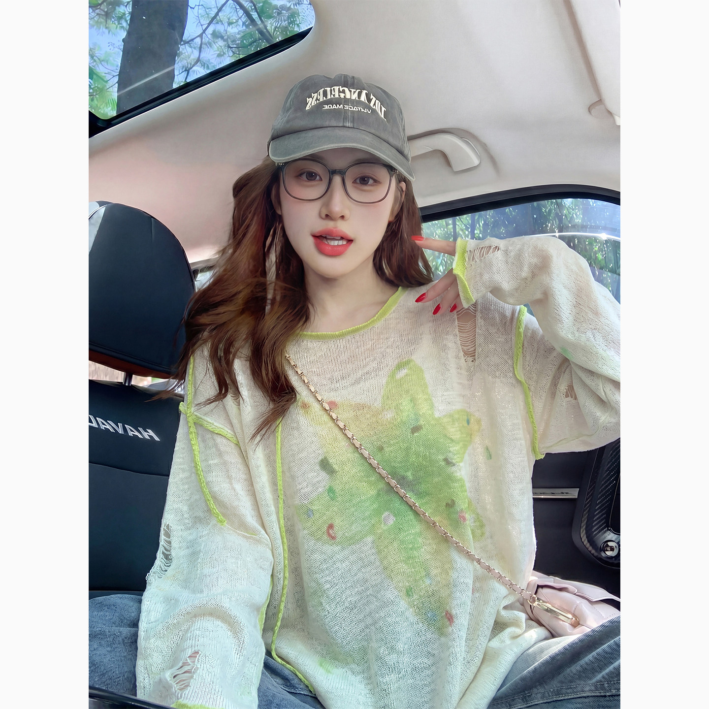 斜肩破洞长袖针织T恤女夏季2026新款度假风慵懒花朵防晒罩衫上衣