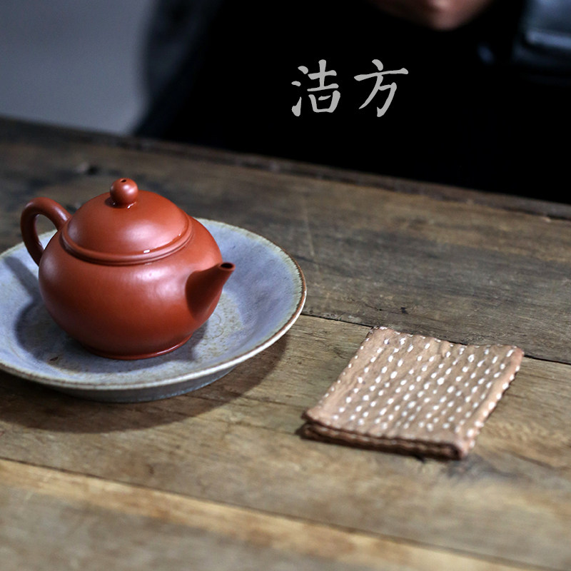 宜兴周边老粗布缝制擦水紫砂茶具图片