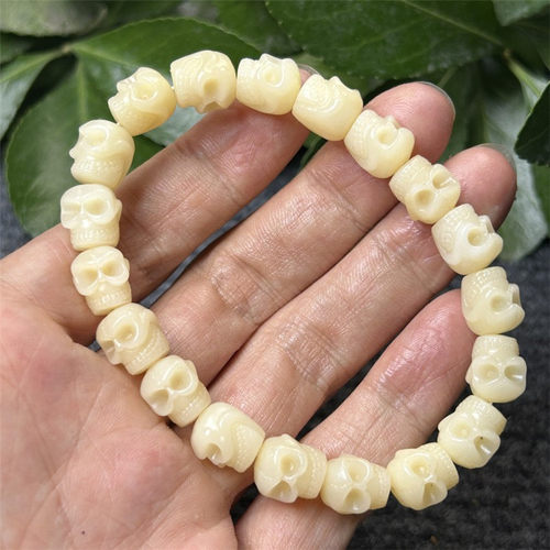 天然原色玉化骆驼骨雕刻骷髅头手串阿呆单圈手链鸡油黄文玩骨头珠