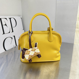可彼娜上新2026小众设计黄色贝壳包女手提包保龄球包大容量高级感