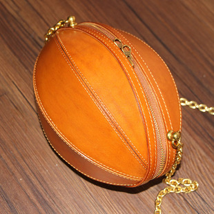 树膏牛皮挎包女个性创意橄榄球包斜挎包时尚小圆包休闲百搭单肩包