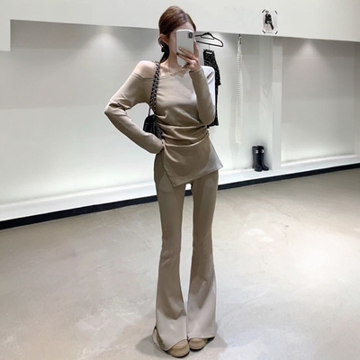 斜领露肩不规则长袖上衣高