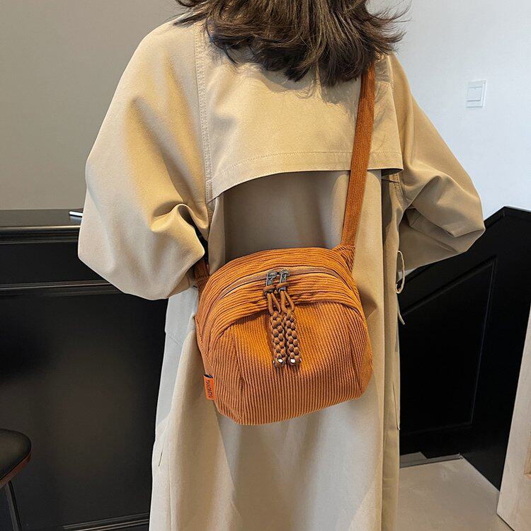 简约大肚子斜挎包单肩包灯芯绒条绒韩版日系百搭休闲小包包新款