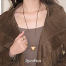 RecoPan重塑未来 复古皮绳毛衣链美拉德 棕金色星星浮雕项链长款
