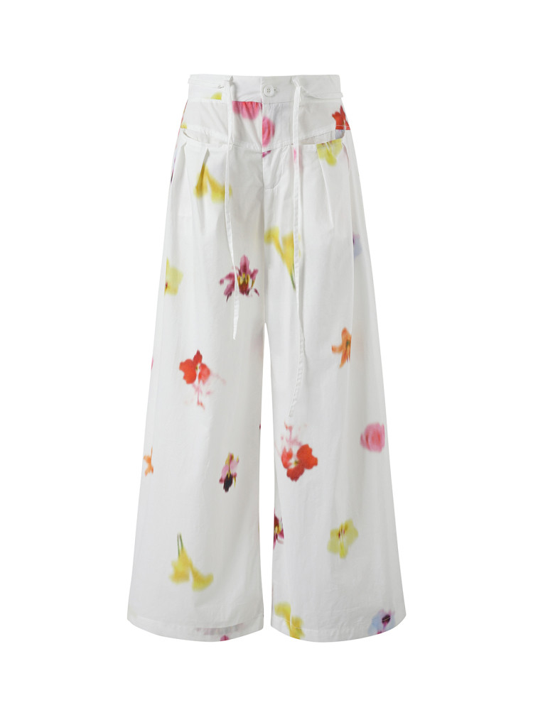 White wide-leg floral print pants on a white background