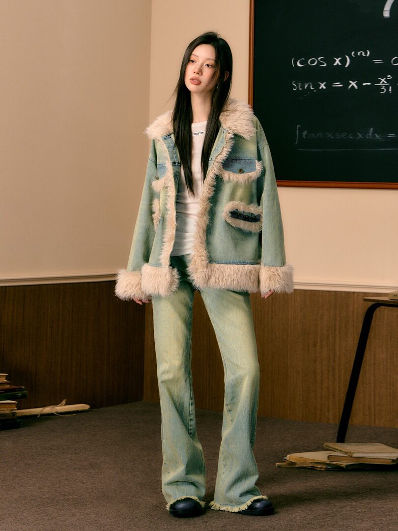 Model wearing a light blue faux-fur trimmed denim jacket and matching jeans