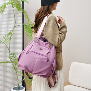 玛莎世家2026上班通勤水杯位手提单肩双肩背大学生书包减负插带潮