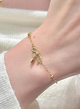 小红书爆款古法金色蝴蝶结流苏金豆手链女时尚轻奢精致简约手饰品