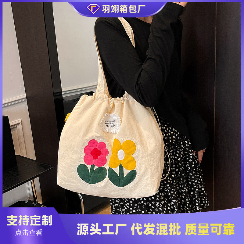 跨境大容量包包女夏季百搭2025新款休闲单肩抽绳包学生上课托特