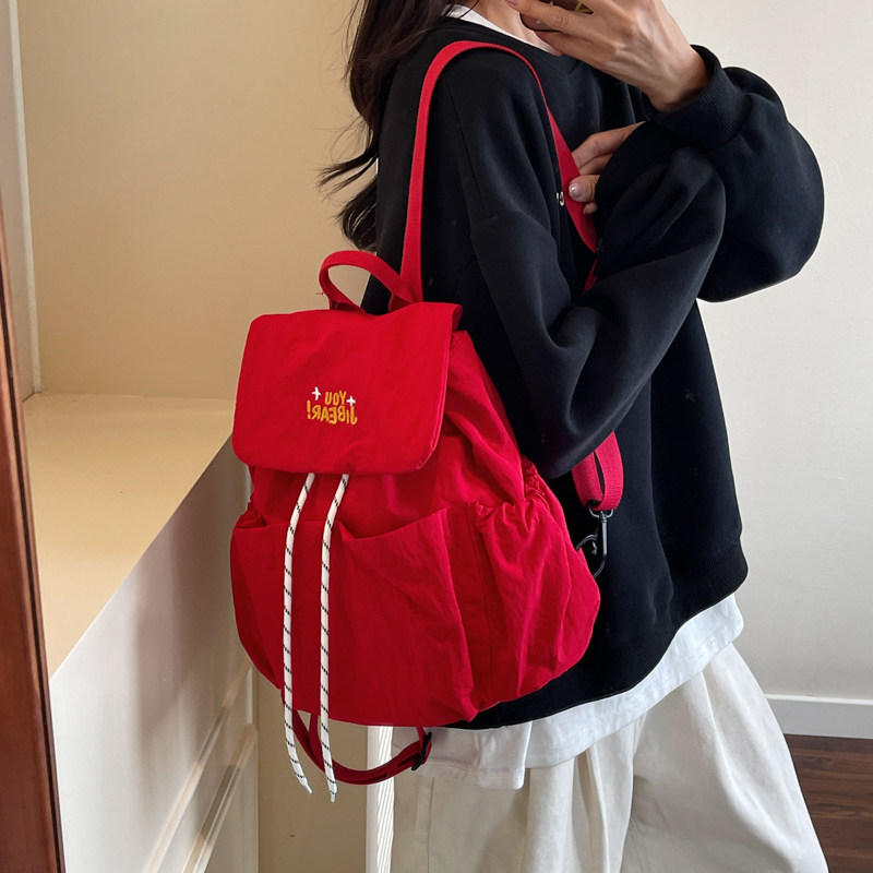 韩版新款时尚街头休闲抽绳翻盖双肩包高颜值背包初高中生学生书包