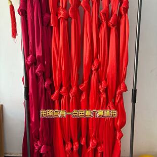 同心结打结辫婚礼吊顶草坪礼堂酒红牛奶丝婚宴布置道具背景装饰布