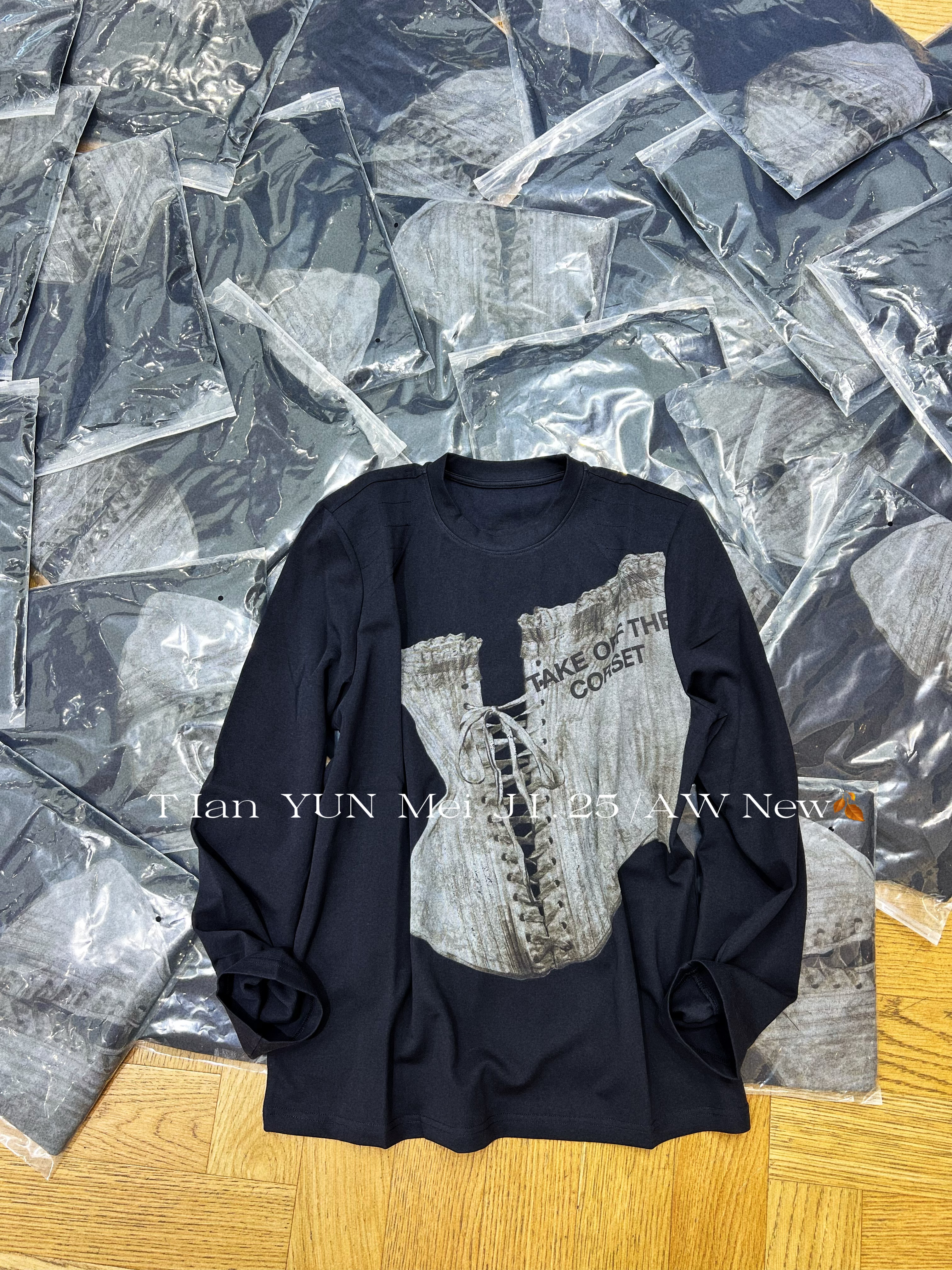 欧洲站2025秋季新品设计师款绑带印花圆领长袖T恤女休闲宽松上衣