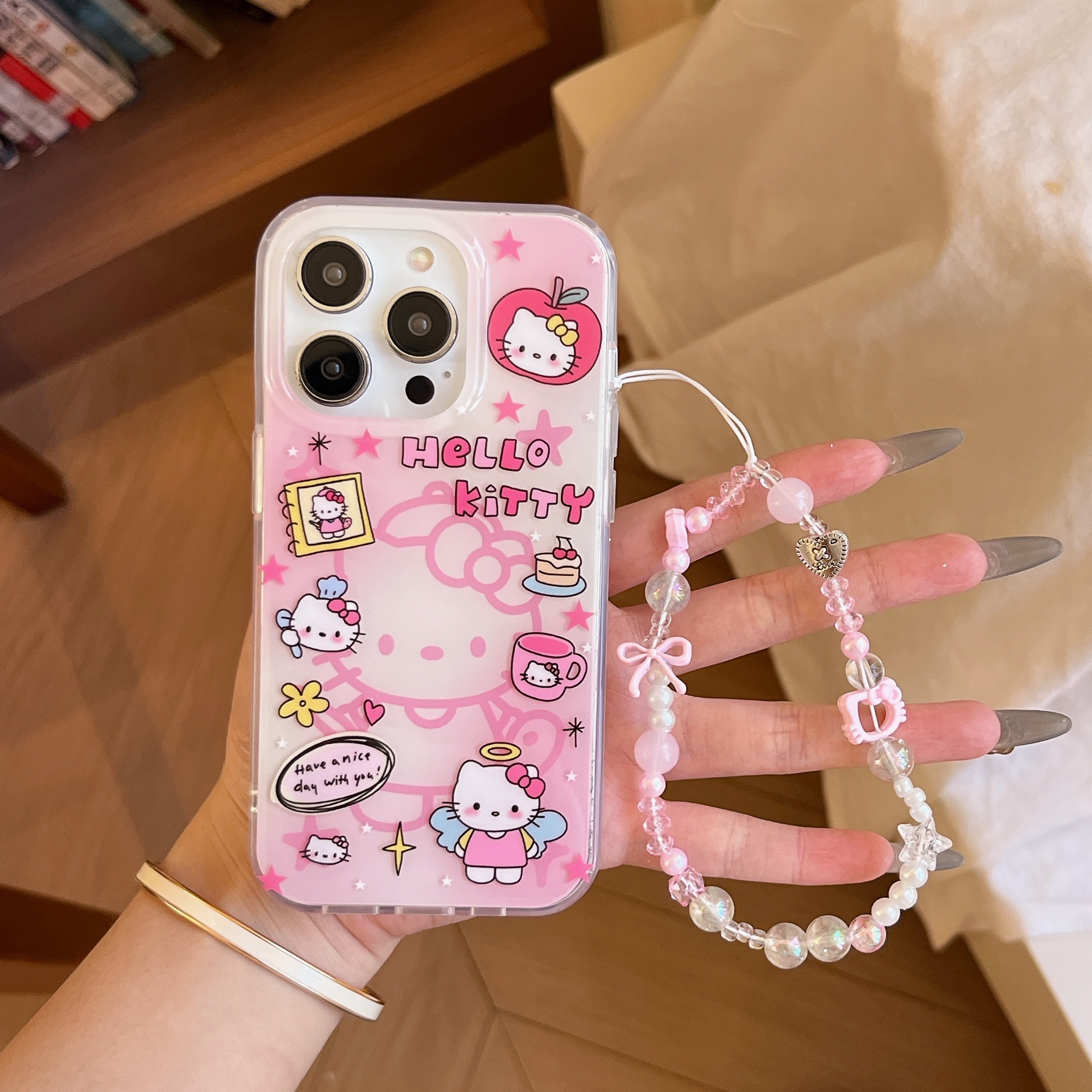 IMD卡通可爱粉色线条kitty猫手机壳适用iphone16promax大孔防摔苹果15女生趣味14亮面13手链甜美韩系