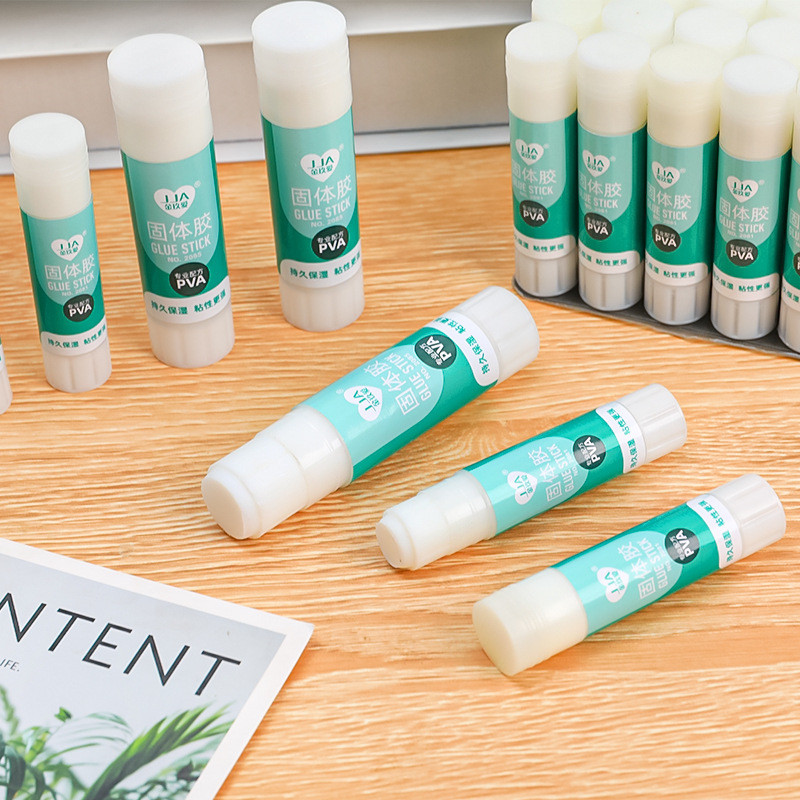 简约绿色胶装订胶粘用品胶棒固体