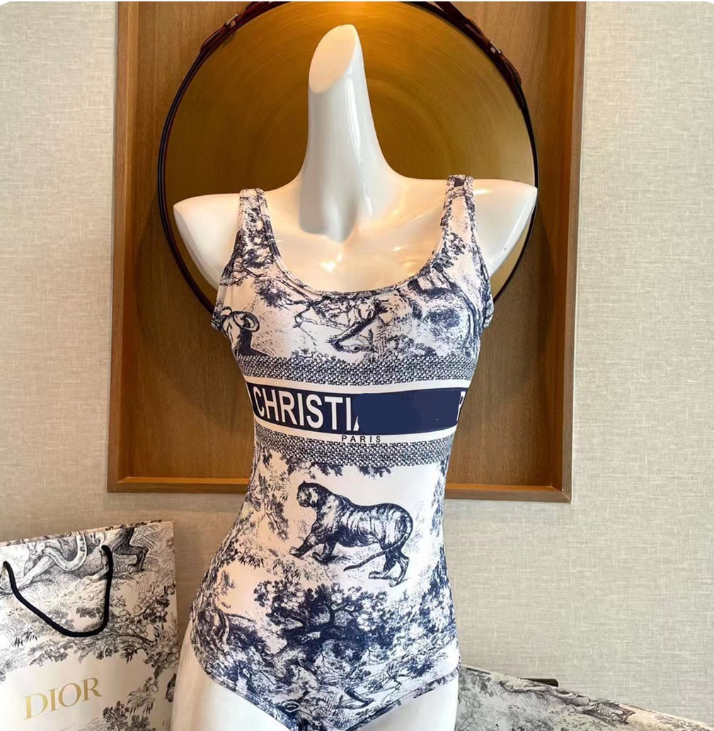 小d家风连体设计老虎无钢圈遮肉显高挑速干弹性女连体游泳衣