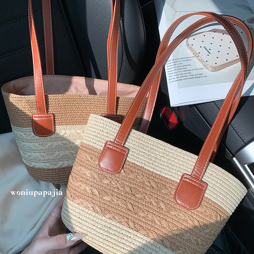 蜗牛爬爬家法式手工草包女2026新款海边沙滩时尚编织手提包水桶包