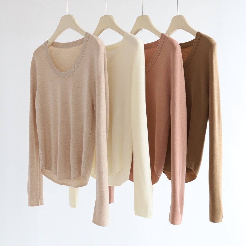 秋冬羊毛混纺下摆弧形针织上衣女