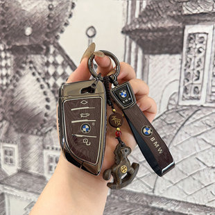 适用宝马5系钥匙套3系x5x3三系壳刀锋x2x1车包525 530车饰扣金属
