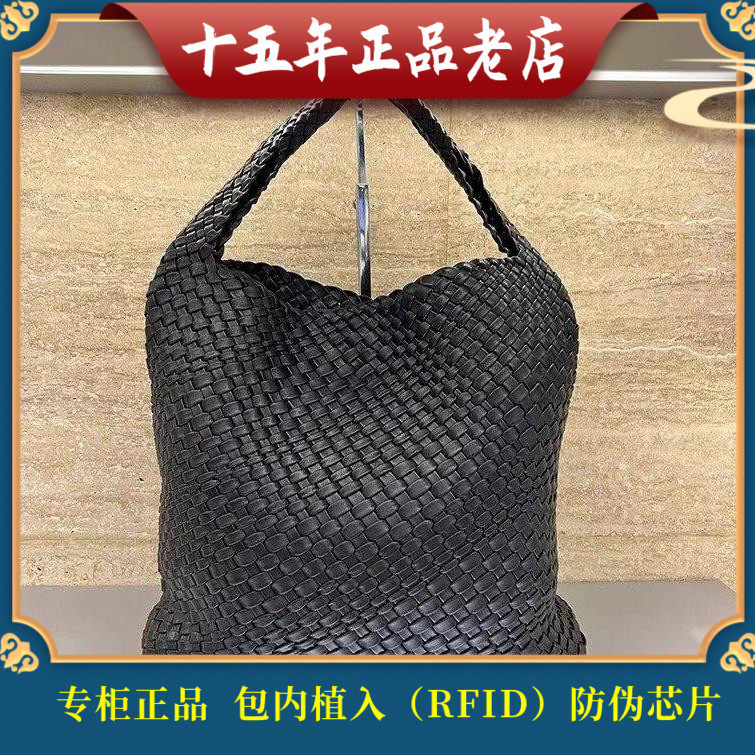 迪桑娜女包2024春夏新款手工编织羊皮大容量水桶子母包轻奢单肩包