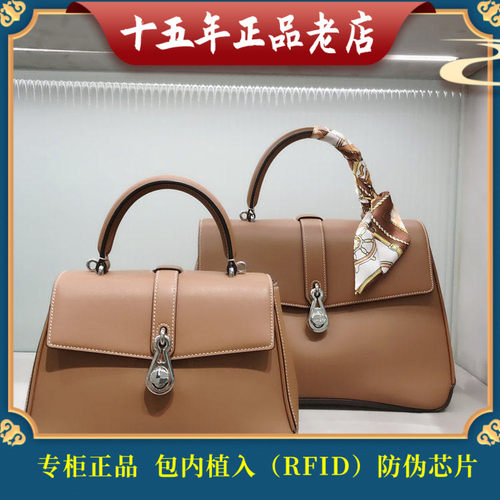 迪桑娜时尚百搭容量牛皮手提包