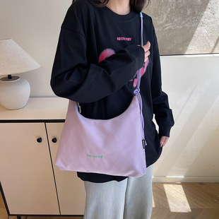 帆布包女大容量2025新款夏季百搭小众设计单肩斜挎包高级感托特包