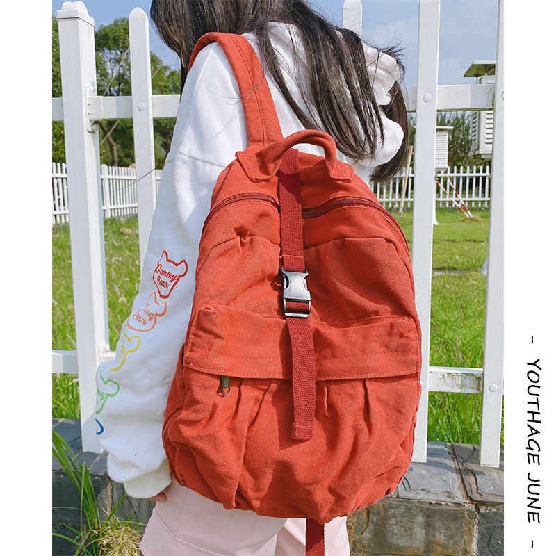 韩国慵懒风纯色双肩包