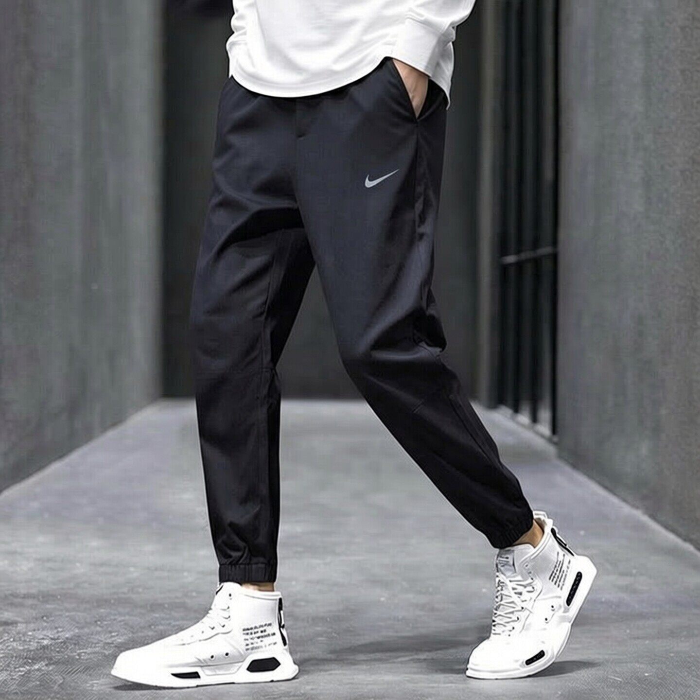 NIKE耐克梭织长裤男裤夏季新款跑步运动裤健身训练裤束脚裤FB7