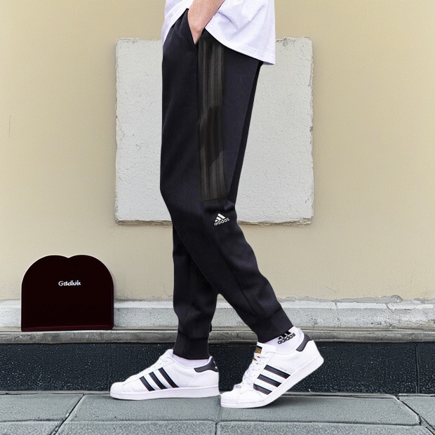 阿迪达斯宽松男黑色针织长裤