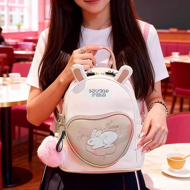 可爱兔耳朵双肩包女卡通毛球装饰背包甜美风小背包青春少女风女包
