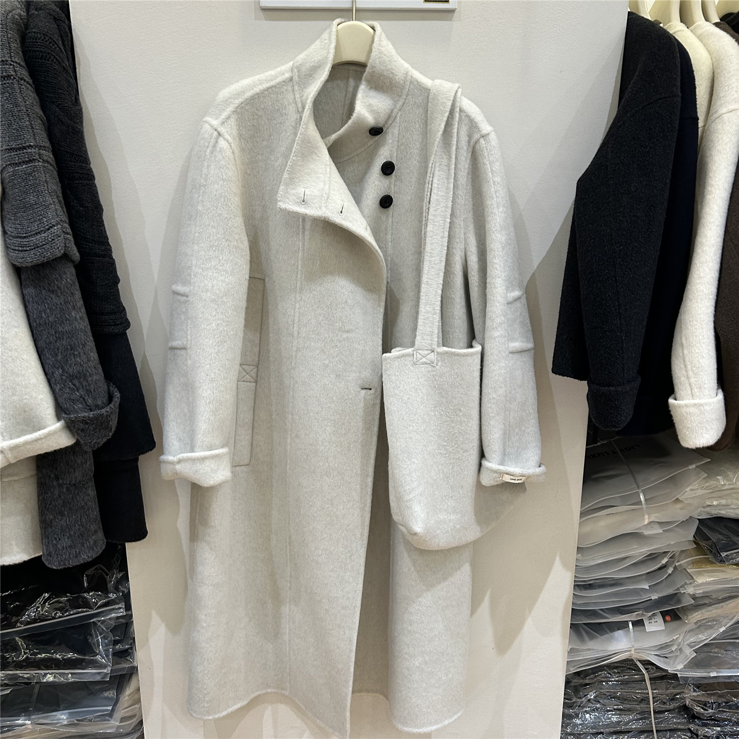 欧洲站2025秋冬季新立领双面羊毛大衣女宽松配包包毛呢中长款外套
