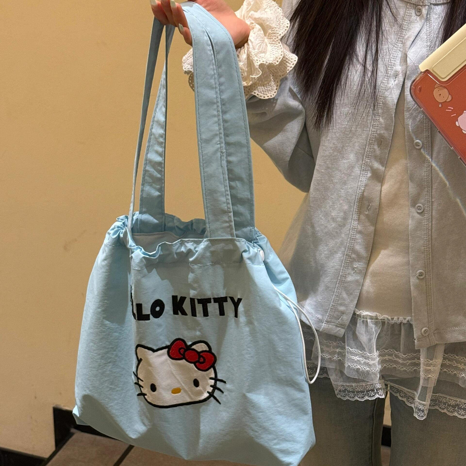 可爱卡通Kitty抽绳帆布包女大容量单肩托特包2025新款通勤购物袋,箱包皮具/热销女包/男包,时尚帆布包,淘宝优惠券,粉丝福利购,淘宝优惠卷