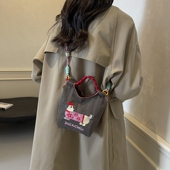 日系刺绣可爱腊肠狗水桶包包女2025新款 手机包百搭通勤单肩斜挎包