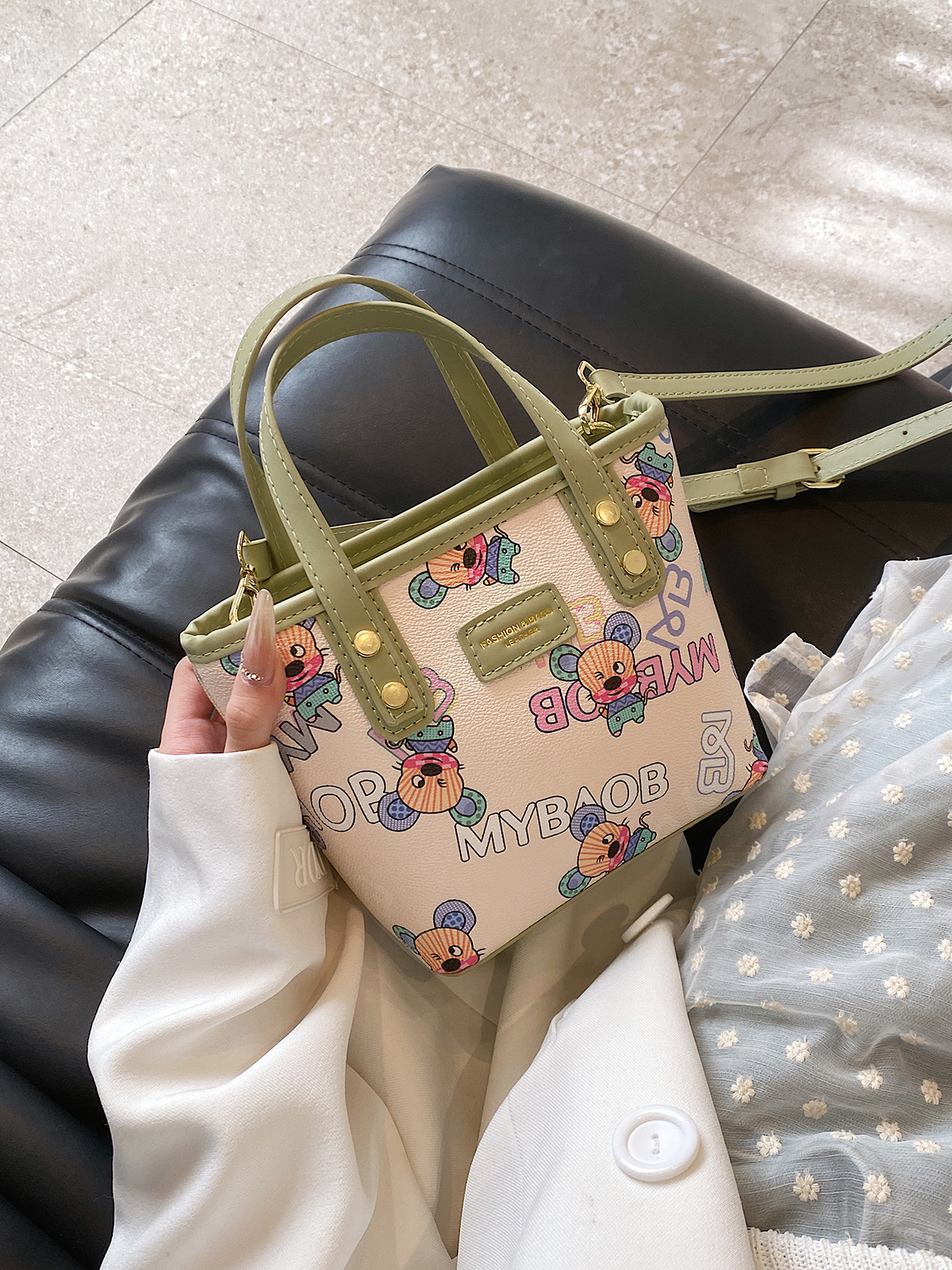 美伢百搭斜挎手提水桶包