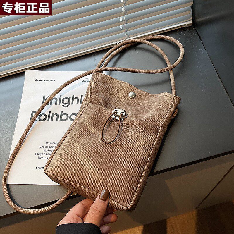 韩国AS品牌日系极简风手机包女2026新款秋冬斜挎零钱小包上课百搭