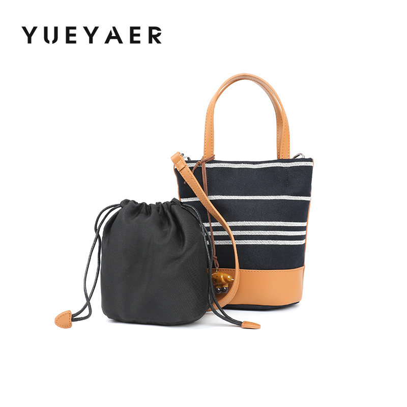 月芽儿2025新款小众设计休闲百搭腋下手提水桶包牛仔布单肩斜挎包,箱包皮具/热销女包/男包,水桶包,淘宝优惠券,粉丝福利购,淘宝优惠卷