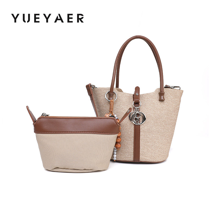 月芽儿新款百搭休闲单肩斜挎包包女高级感小众设计手提水桶包