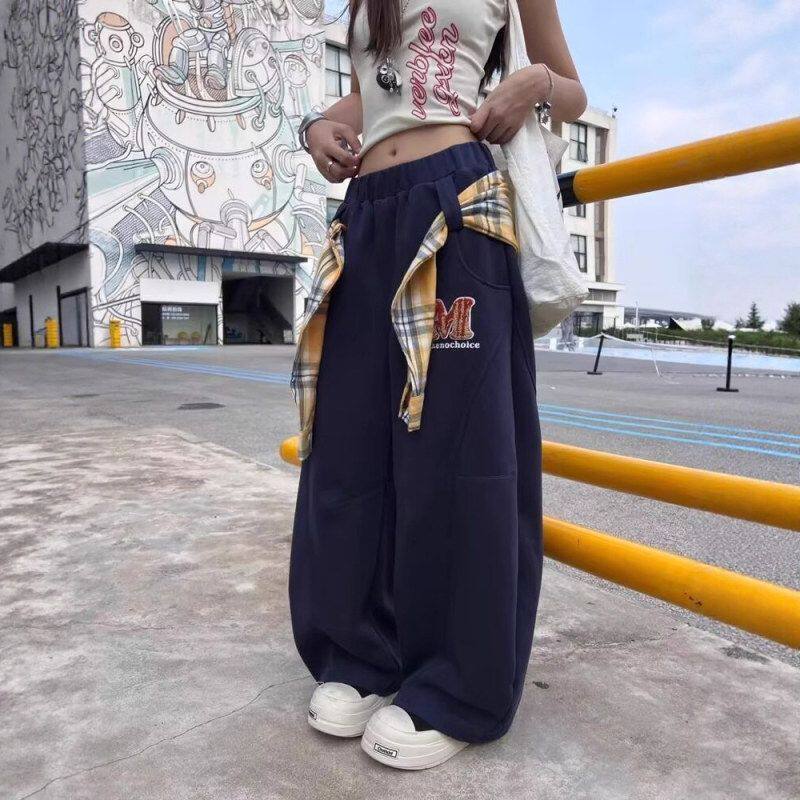 拖地伞兵休闲裤结构设计女慵懒复古秋季拼接运动裤美式格子裙摆风