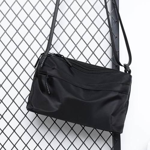 单肩包男斜挎包男女通用帆布小包