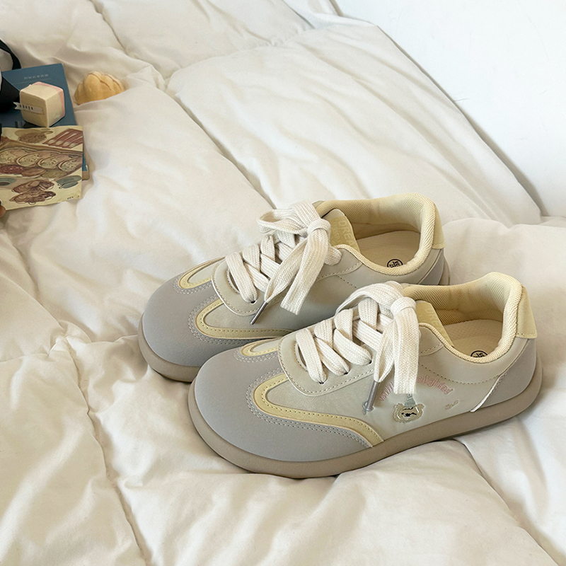 丑萌芒果头奶黄色德训鞋学生运动