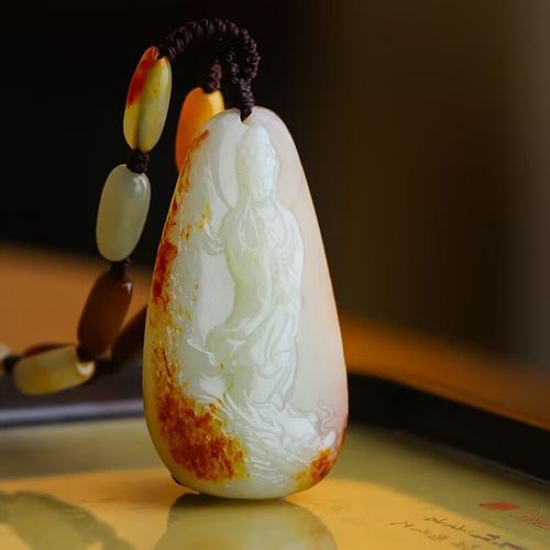 白玉红油皮籽料御龙观音挂件