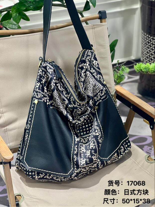 福亿女包2026新款高品质手提大包布包配牛皮时尚单肩斜挎包水桶包